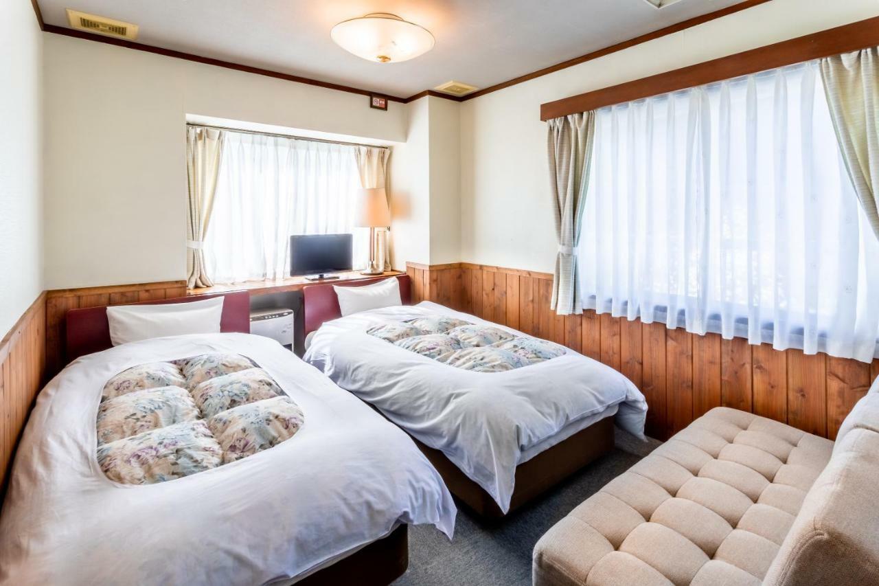 Hotel Community House Tyrolien à Hakuba Extérieur photo
